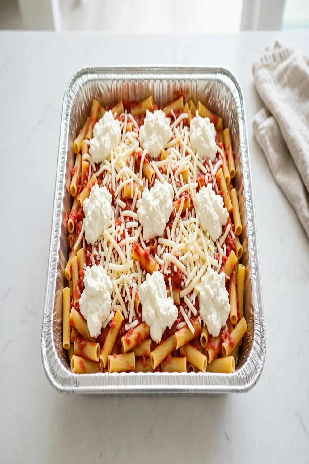 Make ahead tube pasta bake assembled in a freezer safe dish ready for baking