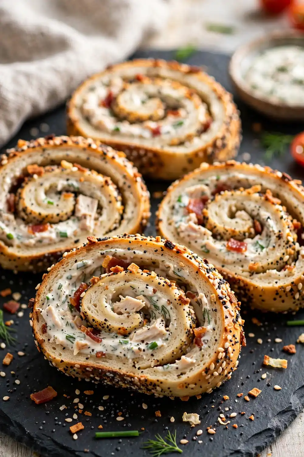Everything bagel seasoned pinwheels with sesame and poppy seed crust