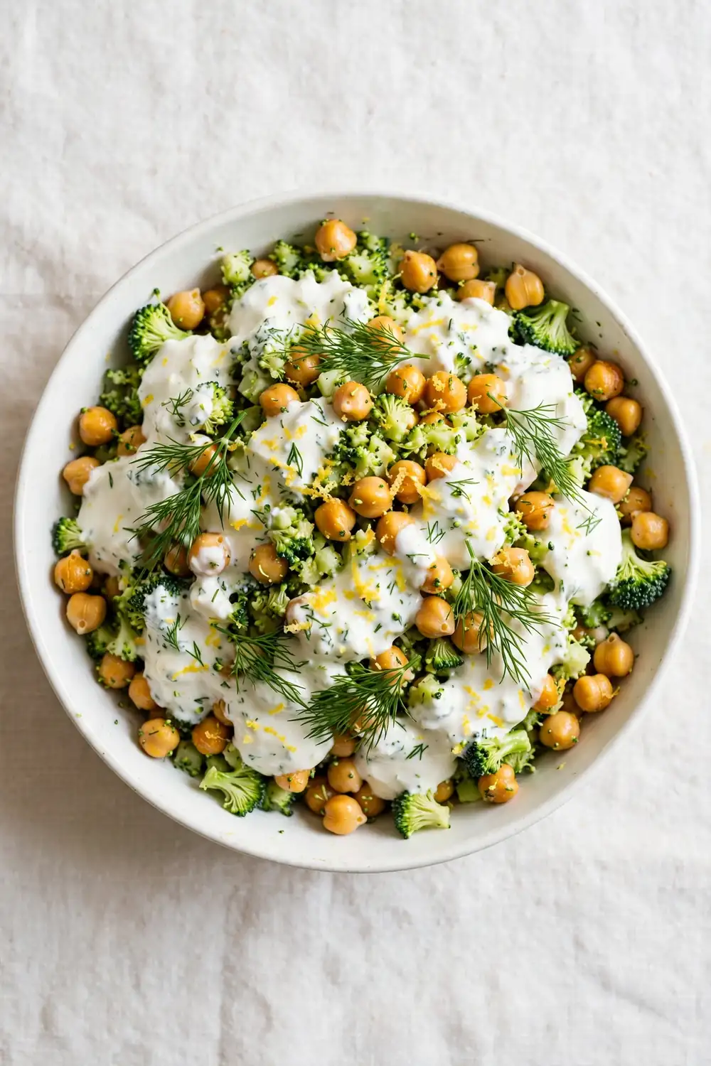 Chopped broccoli and chickpea salad with Greek yogurt dressing and herbs