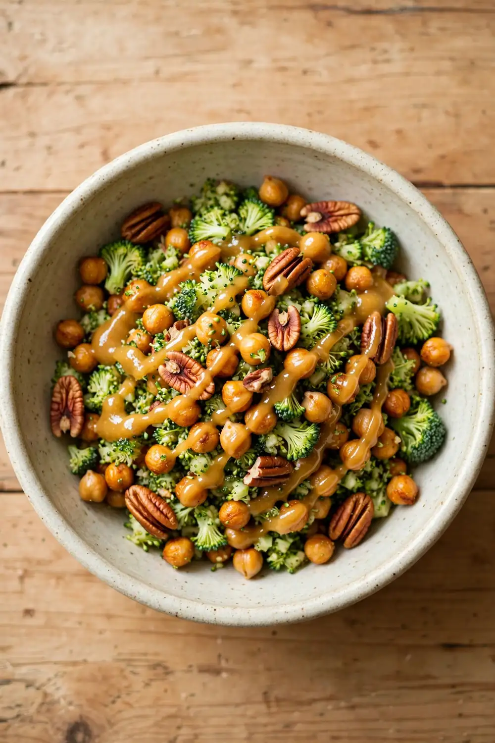 Chopped broccoli and chickpea salad with maple mustard glaze and pecans