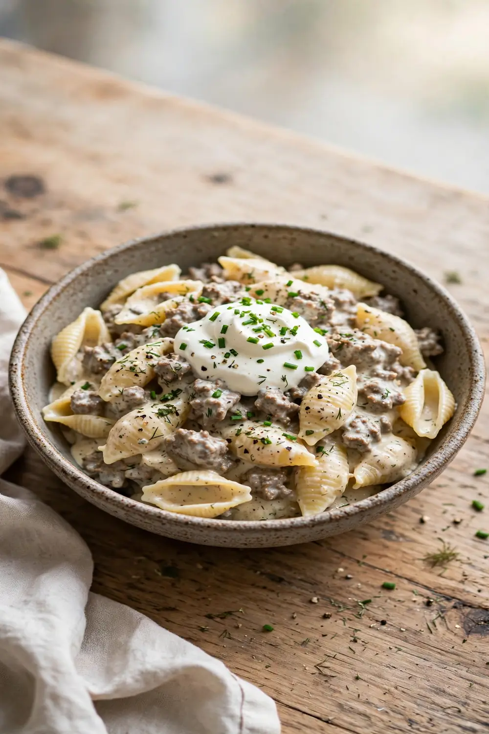 Shell pasta in creamy ranch seasoned beef sauce with chives and sour cream