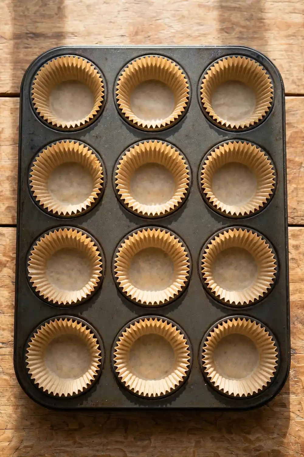 Paper cupcake liners in a metal pan, no foil cups