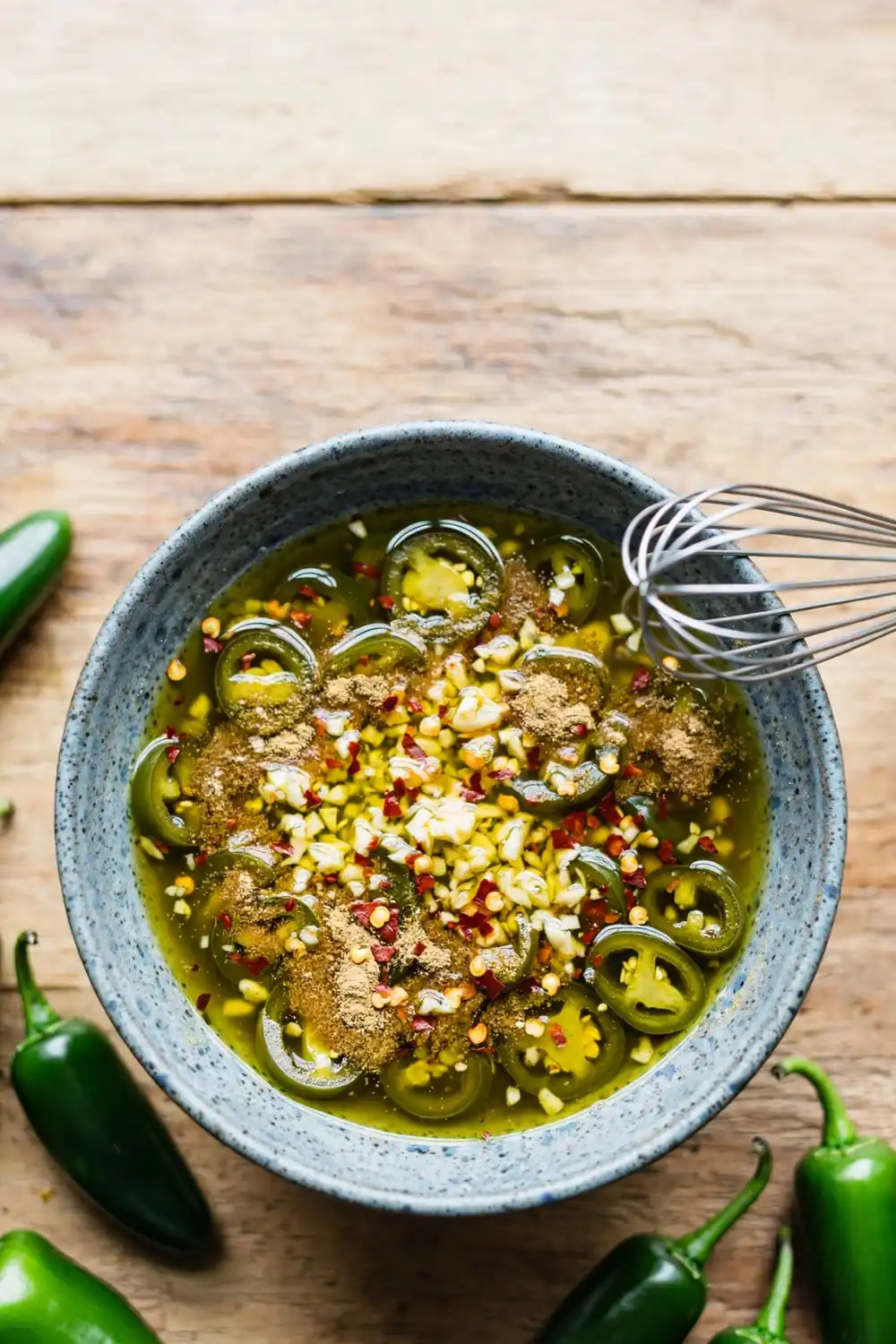 Marinade bowl with jalapeno brine and spices