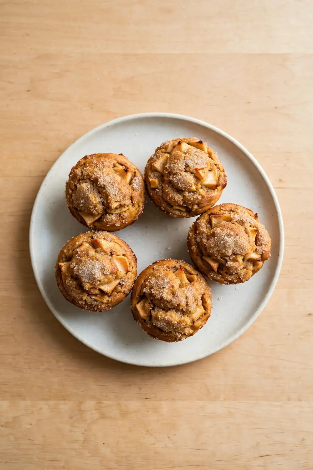 Spiced apple muffins with sugary tops, sweet soup breads