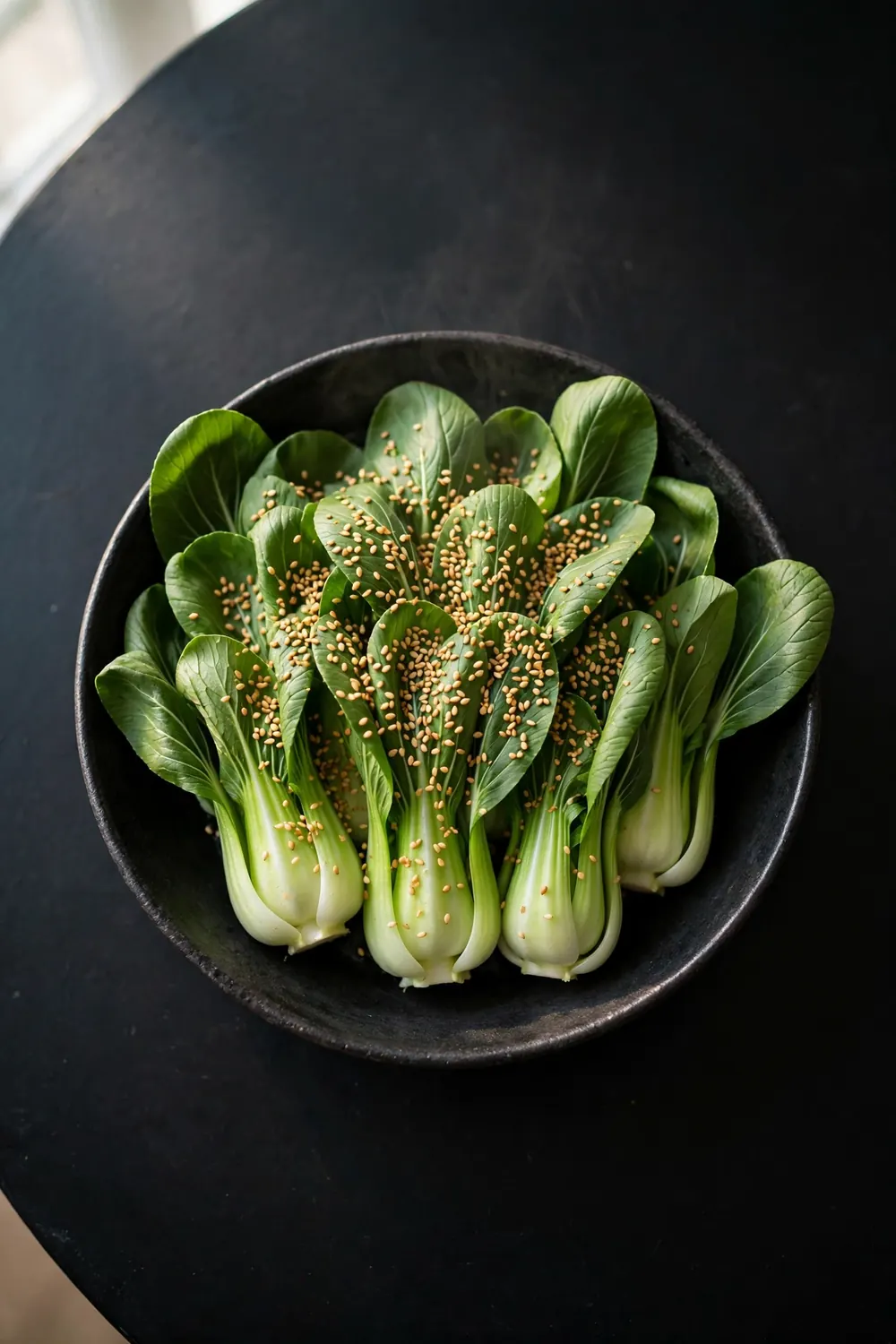 Bok choy topped with toasted sesame seeds