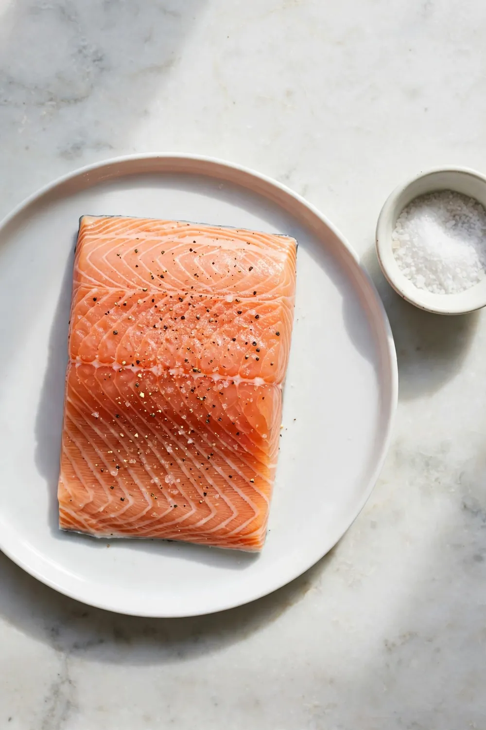 Salmon fillet seasoned lightly with salt and pepper